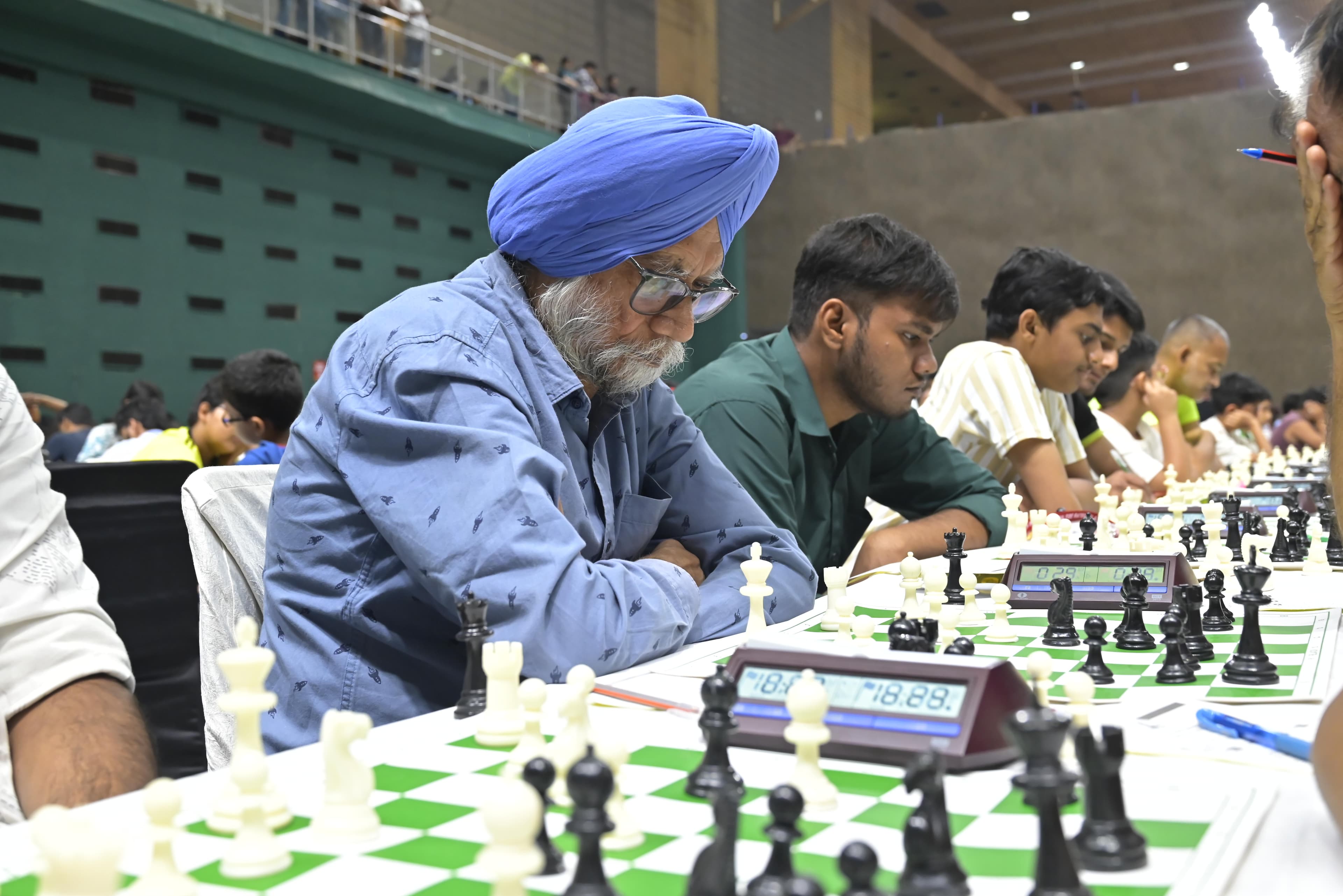 Chess players focused during a competitive round