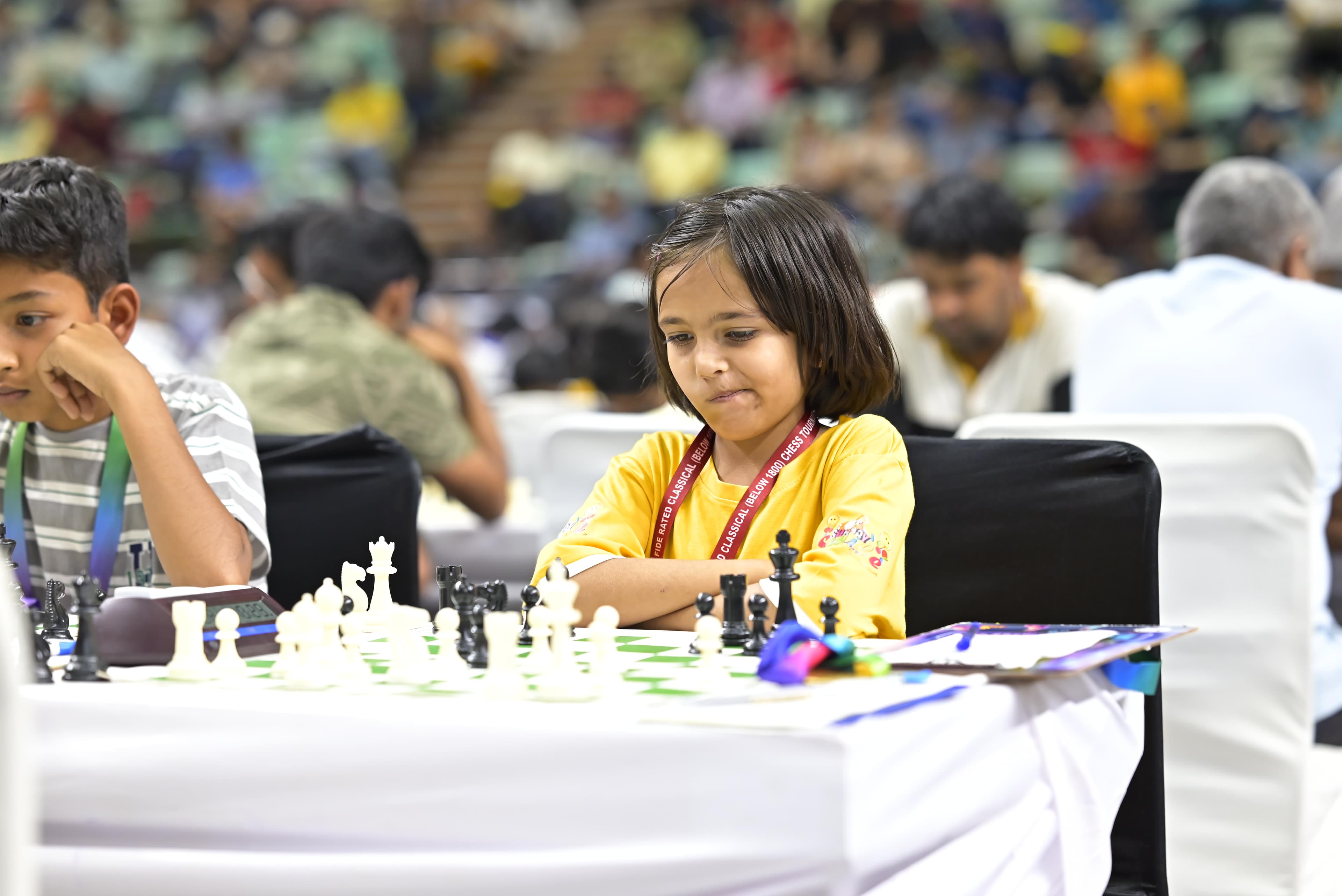 Young chess player thinking during a tournament game